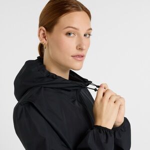 New Balance Women's light weight Black Hooded Jacket/coat